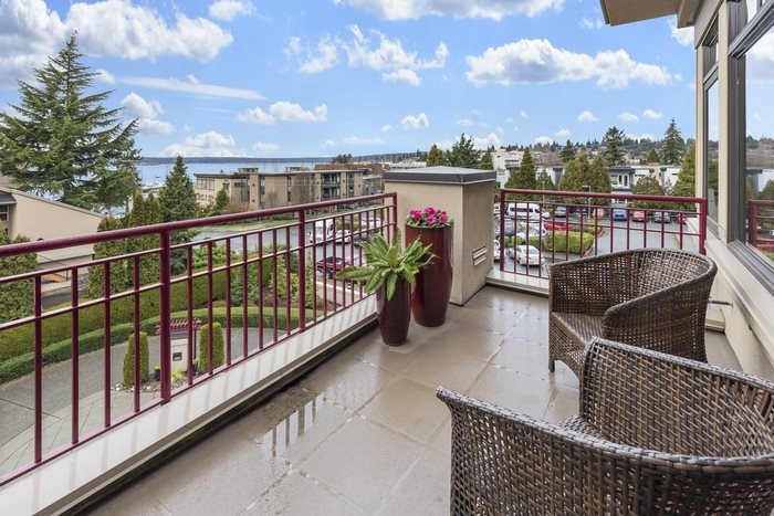 open-balcony-there-are-chairs-and-green